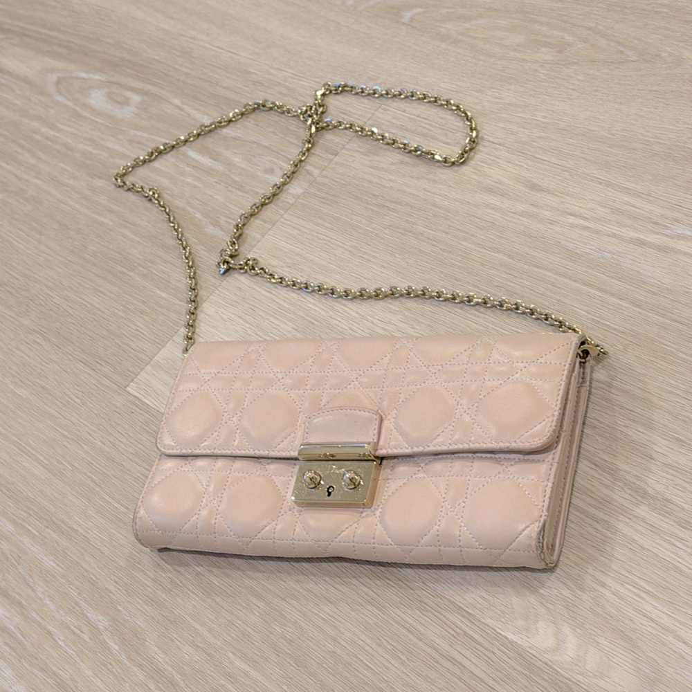Dior clutch. Authentic. Had signs of wear.